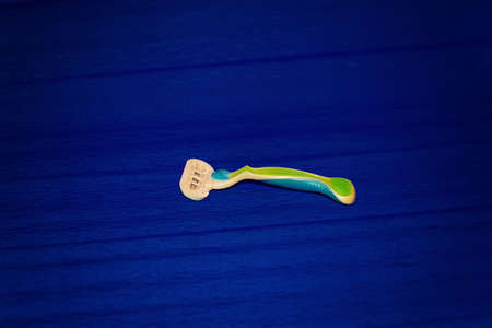Womens razor on a blue backgroundの写真素材
