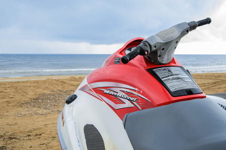 Evrenseki, Turkey - 03.15.2021 Close-up of helm of Yamaha waverunner standing on shore against...