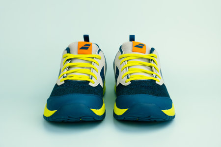 Babolat brand professional tennis shoes. Junior tennis sneakers with cushioning and impact protection. Front view - Paris, France 03/09/2023のeditorial素材