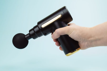 Portable Therapy Massage Gun. Percussion massager. Massager for muscle recovery after injury or...