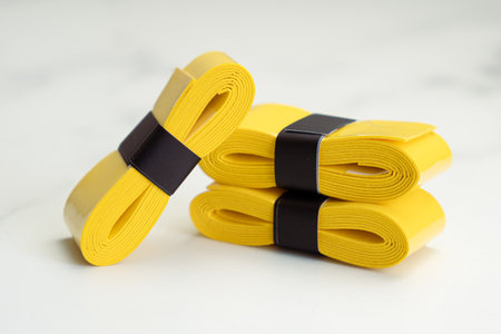 Non-slip absorbent tape for racket sports, horizontal bars and other handles. Anti-slip sticky tennis racket grip tape, sweatbandの写真素材