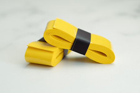 Non-slip absorbent tape for racket sports, horizontal bars and other handles. Anti-slip sticky tennis racket grip tape, sweatbandの写真素材