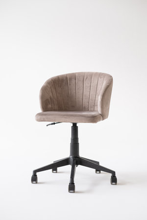 Beige office chair with a rotating seat, wheels and adjustable height on a white background. Office furniture in the online storeの写真素材