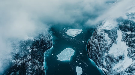 Arctic meltdown stunning retreat of glaciers and icebergs in the greenland sea regionの素材
