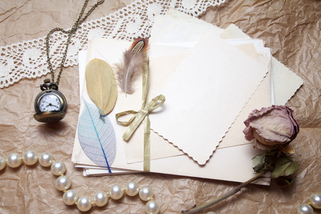 Old accessories and post cards. sentimental vintage backgroundの写真素材