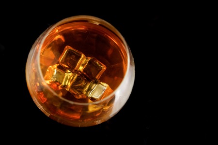 snifter of  brandy in  elegant  glass.  Black backgroundの写真素材