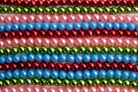 Large amount of madri gras bead background. Top viewの写真素材