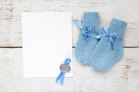 Greeting children form with blue booties. Top viewの写真素材