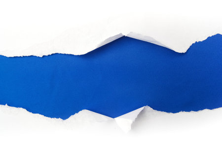 torn white paper on blue background. Cocept for autism awareness day. Break barriers together for autism.の写真素材