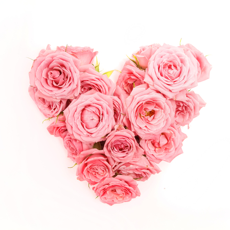 Heart shaped bouquet of roses isolated on white backgroundの写真素材