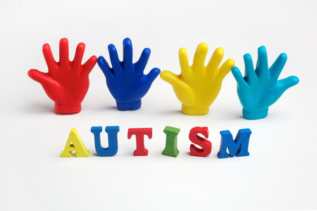 Autism awareness concept with colorful hands on white background. Top viewの写真素材
