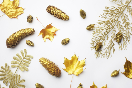 Autumn composition. Frame made of autumn golden leaves on light grey background. Flat lay, top view, copy spaceの写真素材