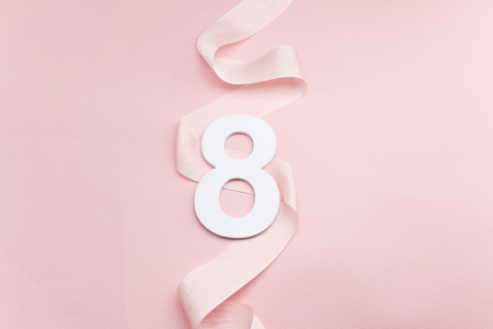 Happy International Womens Day celebrate on eight March. Number eight on pink backgroundの写真素材