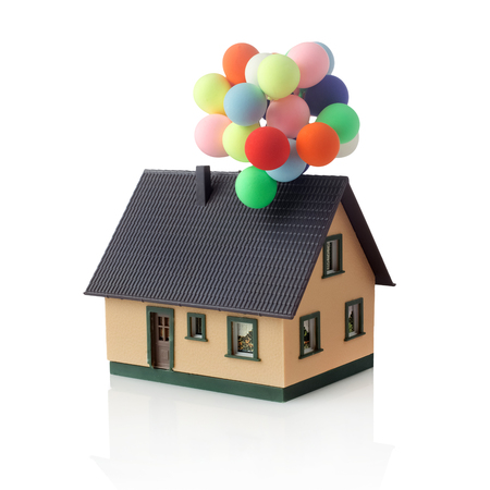 Coloful Air balloons and house isolated on white backgroundの写真素材