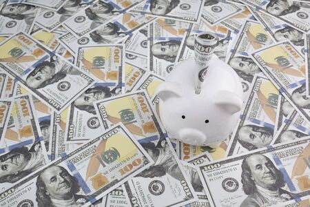close up of dollar cash money and piggy bankの写真素材