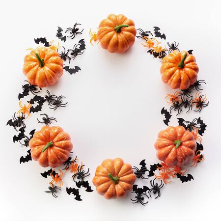 Halloween holiday background with spiders and pumpkin. Top viewの写真素材