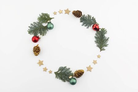 christmas or new year composition. round frame made of christmas decoration on white background. flat lay. top viewの写真素材