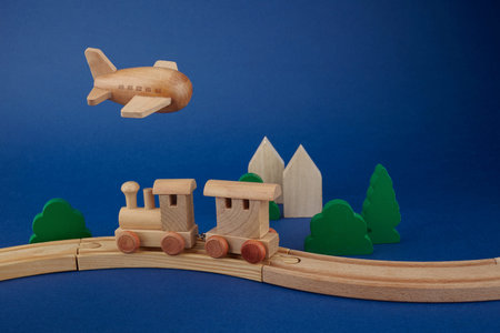 Wooden toys for children on blue background. Eco Toys Background