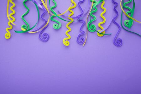 Mardi Gras decoration on purple background. Flat layの写真素材