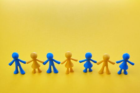 World Down syndrome day on yellow background. Down syndrome awareness concept.の写真素材