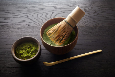 Matcha powder. Organic green matcha tea ceremony. Traditional japanese drink on white background