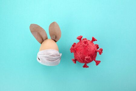 Quarantine easter. Coronavirus epidemic background. Global pandemic. Spring season. Easter egg.の写真素材