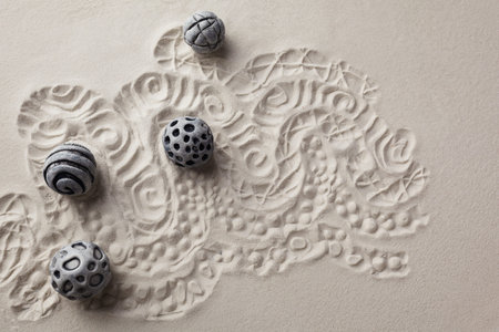 Sensory sand game. Modern zen garden concept. Top view