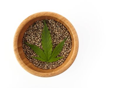 Cannabis seeds and green leave. Vegetarian healthy food. Healthy lifestyle. Flat lay, top view.の写真素材