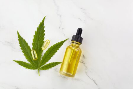 Cbd oil, cannabis extract. Medical marijuana, hemp oil in bottle.の写真素材