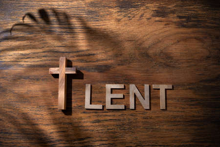 Cross and Lent word as fast and abstinence period concept. Top viewの写真素材