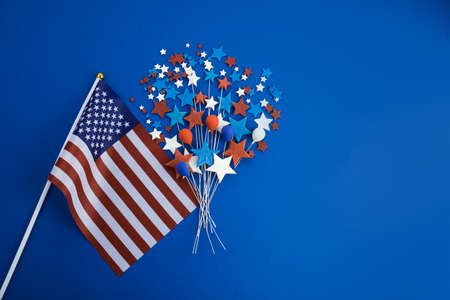 Happy Labor Day banner. Red, white, blue color stars and baloons with flag on blue background.の写真素材