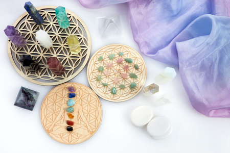 Meditation, reiki and spiritual healing background. Healing crystals grid.
