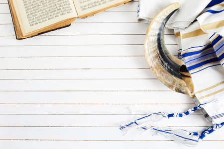 Yom kippur, Rosh hashanah, jewish New Year holiday, concept. Religion image of shofar - horn on white prayer talit.の写真素材