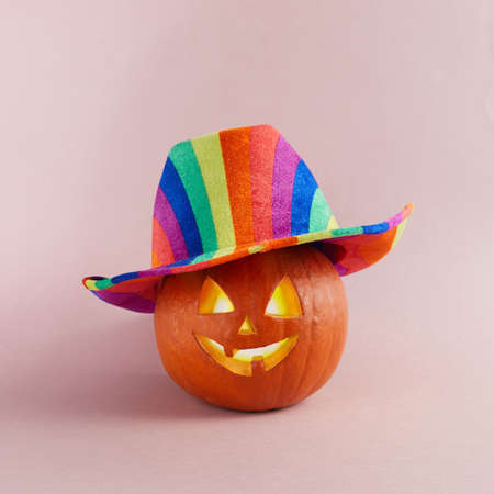 LGBTQ color hat on pumpkin, background for Halloween.の写真素材