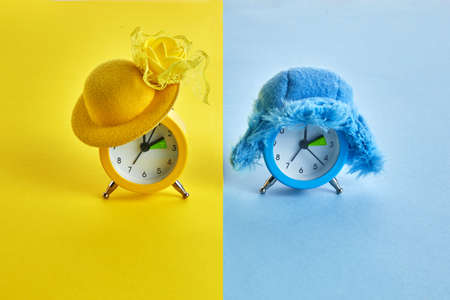 Clock switch to summer time and to winter time. Set of alarm clocksの写真素材