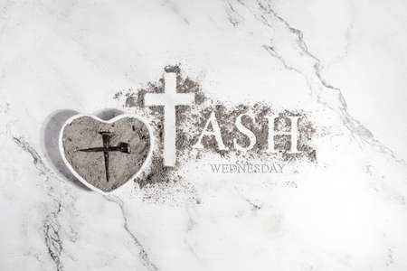 Ash wednesday, crucifix made of ash, dust as christian religion. Lent beginningの写真素材