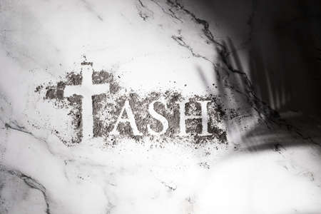 Ash wednesday, crucifix made of ash, dust as christian religion. Lent beginningの写真素材