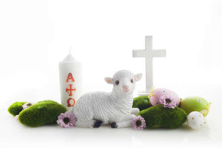 Easter lamb, eggs and cross on white background. Catholic Easter backgroundの写真素材