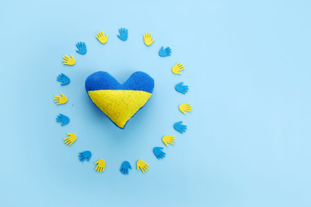 Pray for peace Ukraine. Hands with heart. No war.