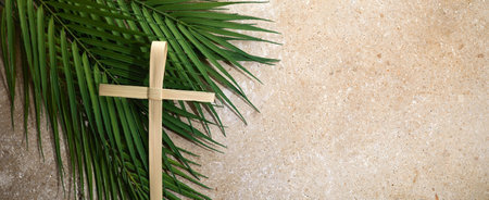 Palm cross and palm leaves. Palm sunday and easter day concept.