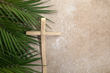 Palm cross and palm leaves. Palm sunday and easter day concept.