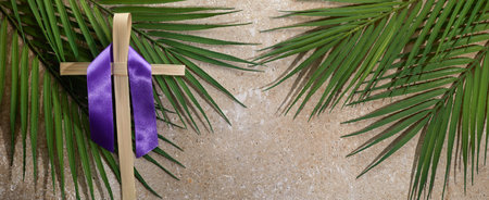 Palm cross and palm leaves. Palm sunday and easter day concept.