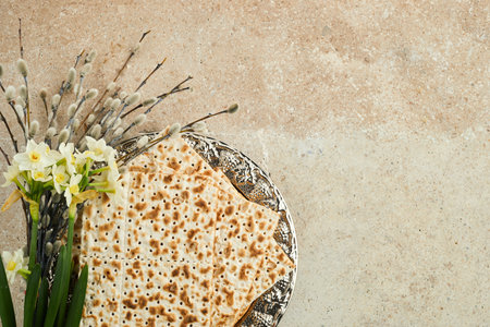 Pesah celebration concept, jewish Passover holiday. Traditional ritual Jewish bread on travertine stone backgroundの写真素材