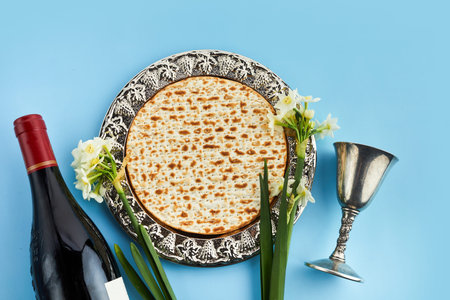 Pesah celebration concept, jewish Passover holiday. Matzah and red kosher. Traditional ritual Jewish...