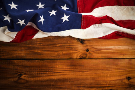 American flag for Memorial Day or 4th of July. American Flag On Dark Wooden Backgroundの写真素材