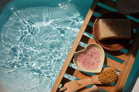 Spa decoration, relaxation preparation, natural organic products on a bathtube.