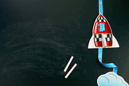 Back to school creative banner. Rocket ship launch with chalks.の写真素材