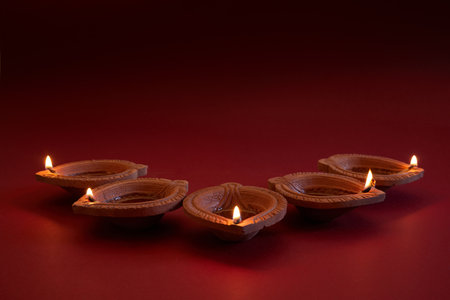 Happy Diwali. Diya lamps lit during diwali festve celebrationの写真素材