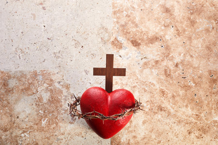 Sacred Heart of Jesus, surrounded by a crown of thorns and with wooden crossの写真素材
