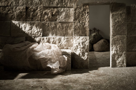Empty tomb while light shines from the outside. Jesus Christ Resurrection. Christian Easter concept.の写真素材